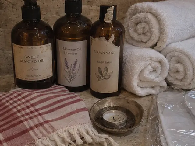 Tatlı badem ve argan yağı, havlular ve peştemal — Ataköy, Masaj Salonun